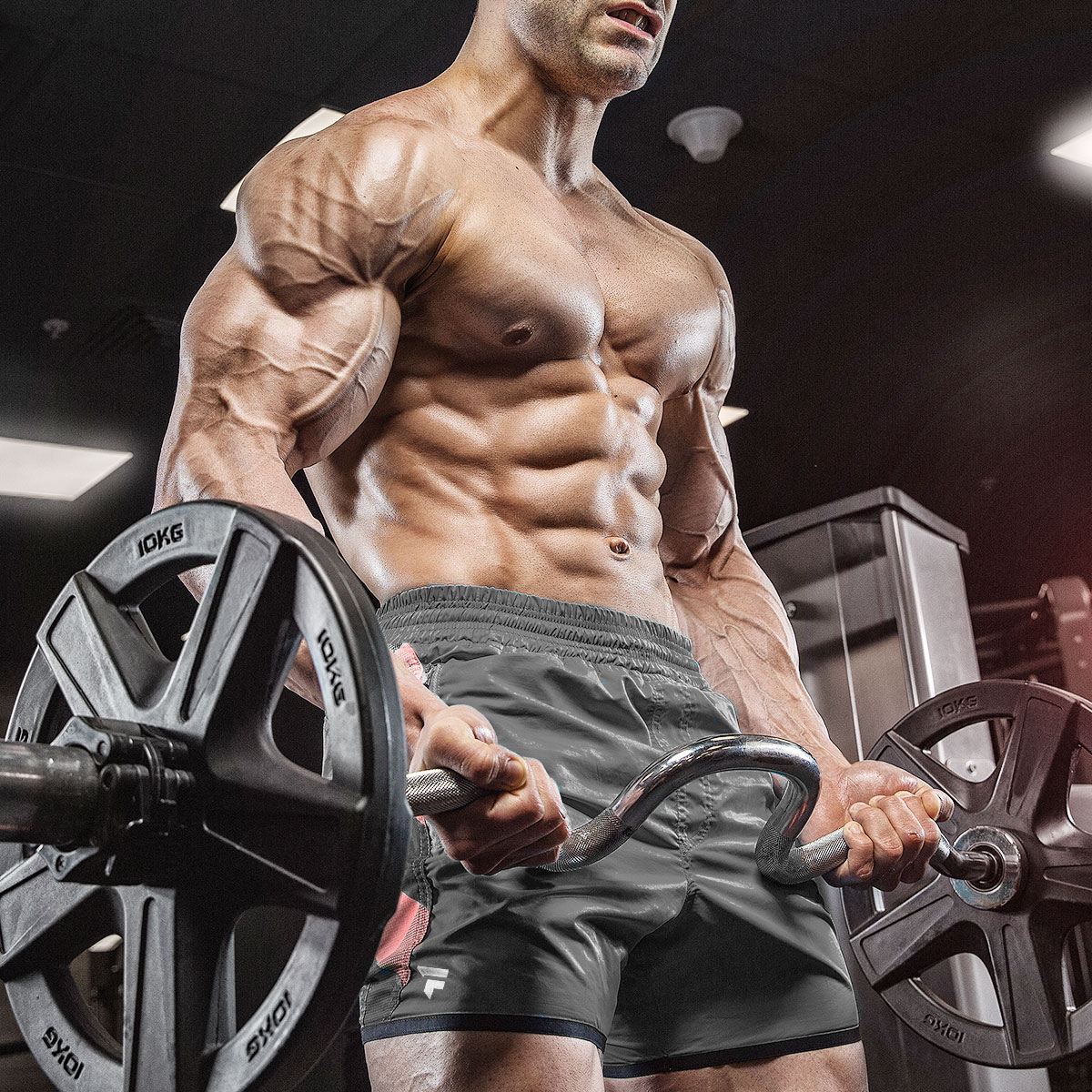 Veiny Shirtless Man Lifting Weights